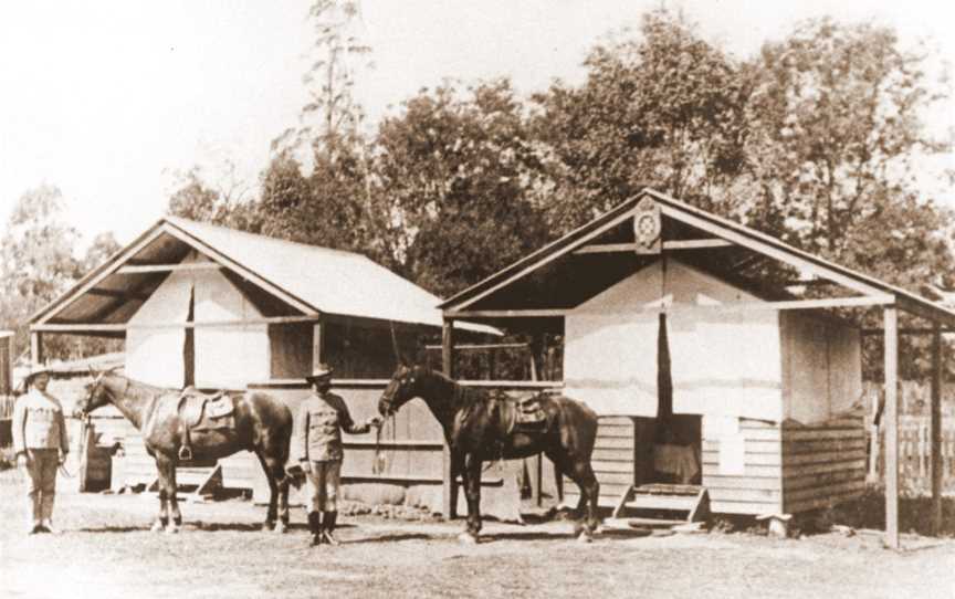 Blackbutt Police Station C1912.Notethestationbadgeattachedtothepeakoftherighthandtent