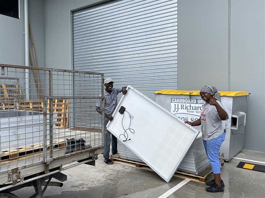 Couple holding REA Fusion Solar Panel Module