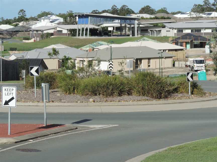 Looking from Jasmine Crescent across new housing developments towards the Mother Teresa Catholic Primary School, Ormeau, 2014.JPG