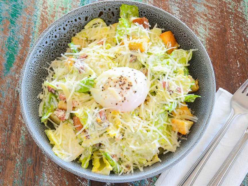 Caesar salad, crispy cos lettuce, croutons, bacon lardons, Parmesan dressing & poached egg