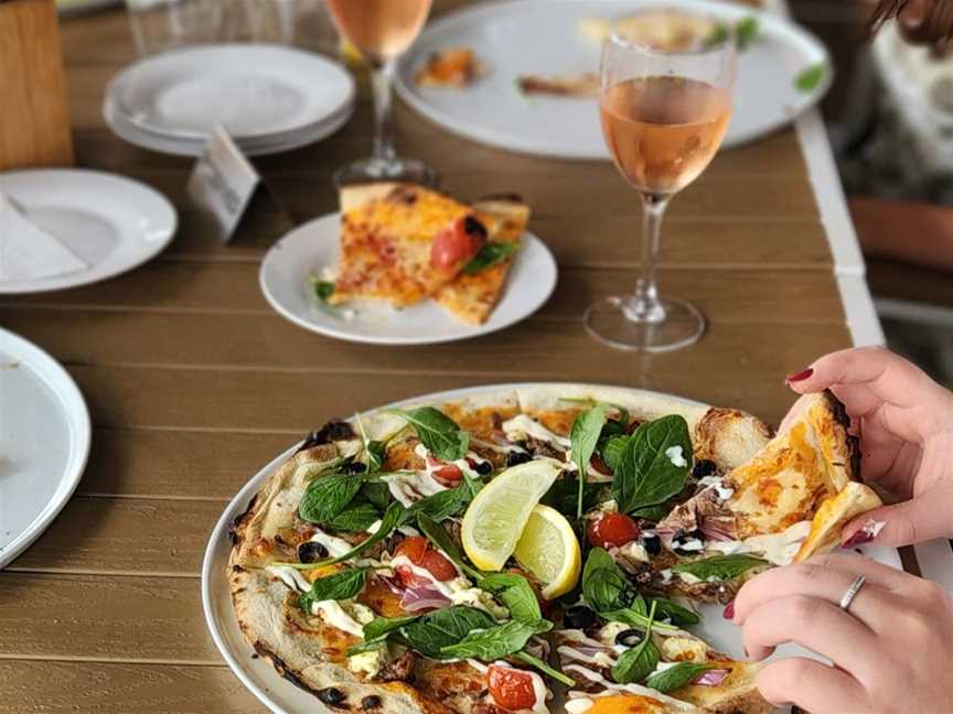 Enjoy a delicious pizza! Perfectly paired with our premium wines